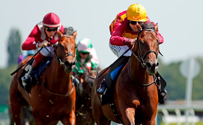 BAYSIDE BOY (right) and Jack Mitchell win the Bet365 EBF Novice Stakes at Newbury